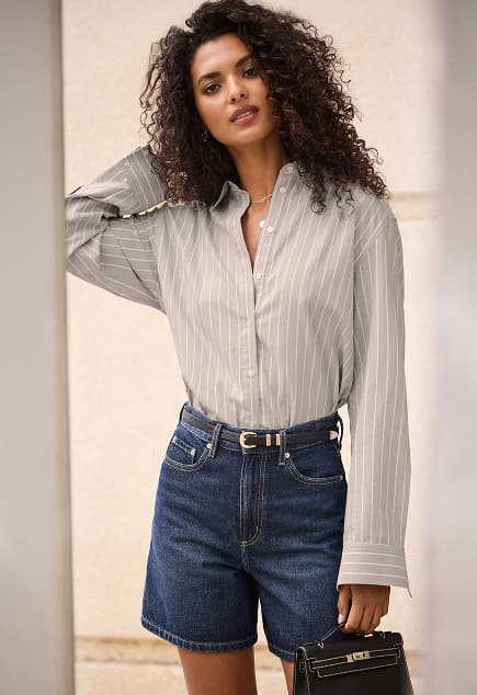 Charlie high-rise A-line denim short.