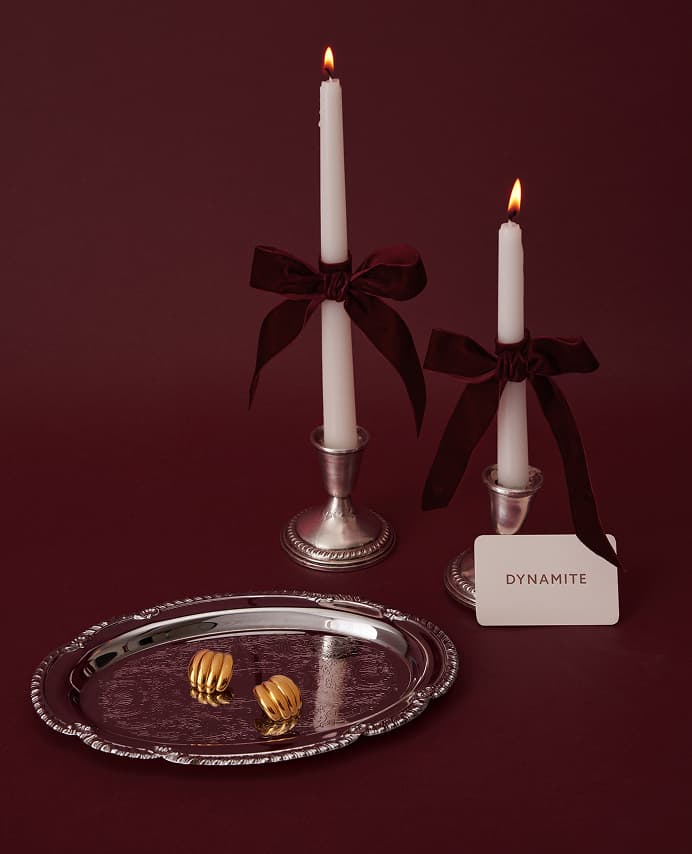 A tray of gold jewelry.