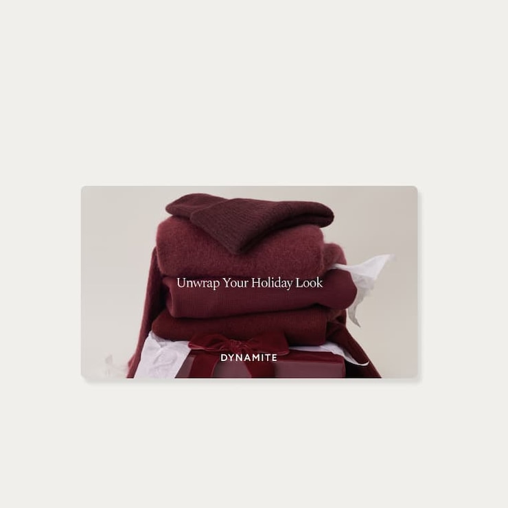 A gift card with an image of a folded pile of burgundy knitwear including a beanie, a cardigan, and a sweater.